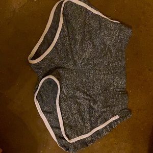 gray athletic shorts white trim